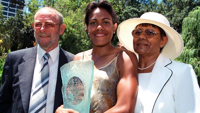 Cathy Freeman with her mother Cecilia and stepfather Bruce Barber